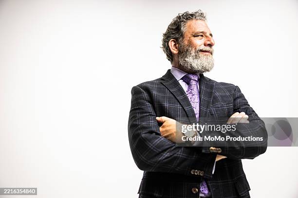 studio portrait of businessman smiling on white background - business person isolated stock pictures, royalty-free photos & images