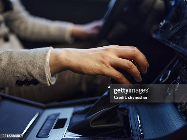 woman's hand on a gearshift! - automatic gearshift stock pictures, royalty-free photos & images