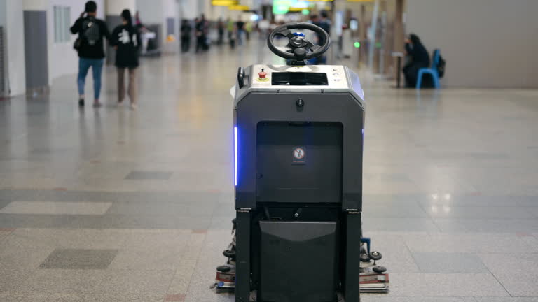https://media.gettyimages.com/id/2216392027/video/autonomous-cleaning-robot-self-driving-floor-cleaning-robot-working-inside-public-space-of.jpg?b=1&s=640x640&k=20&c=WHUh_2wFI3TrxfQoD6YDzCIgJhgq15b4Tpef69B7_ik=