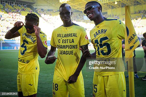 Villarreal's Willy Kambwala Ndengushi, Villarreal's Thierno Mamadou Barry, and Villarreal's Pape Alassane Gueye stand together after the La Liga...