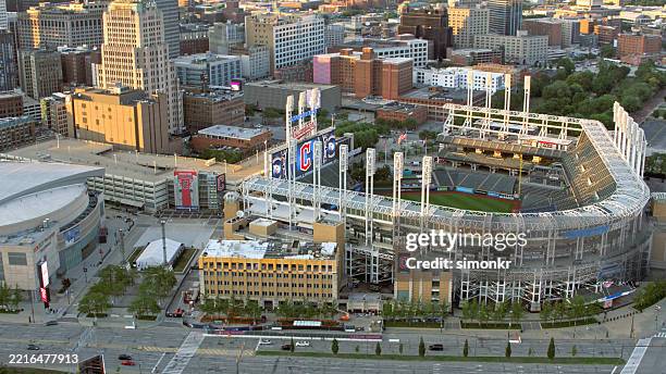 aerial view of cleveland's progressive field and downtown - cleveland ohio stock pictures, royalty-free photos & images