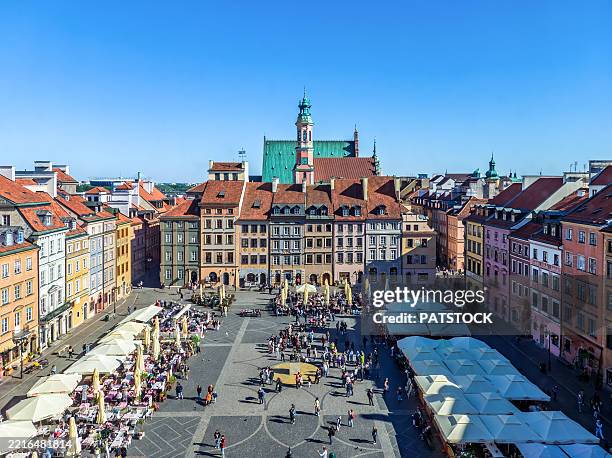 an elevated view of the old town market square in warsaw - market square stock pictures, royalty-free photos & images
