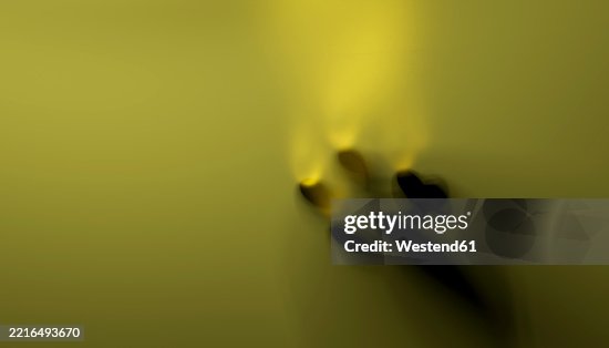 Abstract 3D rendering with shadows on a yellow gradient background, creating a soft blurry effect Abstract 3D rendering with shadows on a yellow gradient background, creating a soft blurry effect
