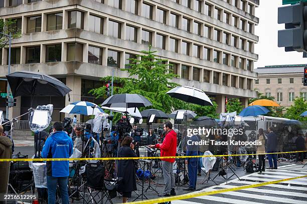 International media set up near the crime scene where two Israeli Embassy staff members were killed yesterday evening outside an event at the Capital...