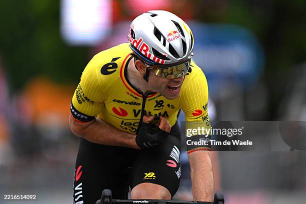 Wout Van Aert of Belgium and Team Visma | Lease a Bike celebrates the victory of his teammate Olav Kooij of Netherlands during the 108th Giro...