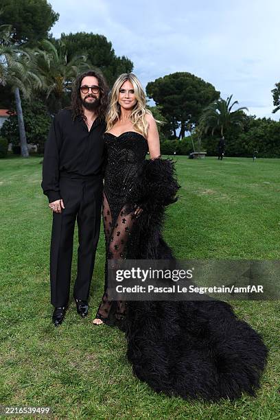 Tom Kaulitz and Heidi Klum attend the amfAR Gala Cannes 2025 presented by Chopard at Hotel du Cap-Eden-Roc on May 22, 2025 in Cap d'Antibes, France.
