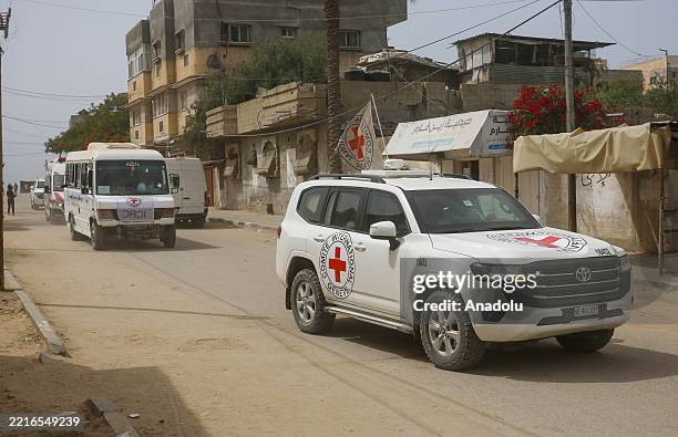 Palestinian detainees released by Israel are seen arriving in Deir al-Balah, Gaza, via the International Committee of the Red Cross, before being...