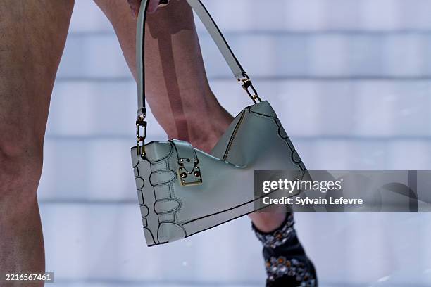Model, handbag detail, walks the runway during the Louis Vuitton Cruise 2026 at Palais Des Papes on May 22, 2025 in Avignon, France.