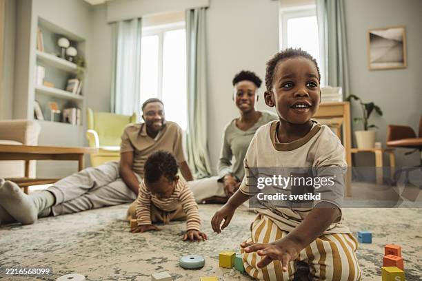 happy family at home - family at home stock pictures, royalty-free photos & images