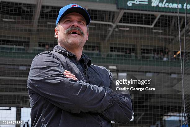 Actor David Harbour stands on the field prior to the game between the Colorado Rockies and the Chicago Cubs at Wrigley Field on Monday, May 26, 2025...