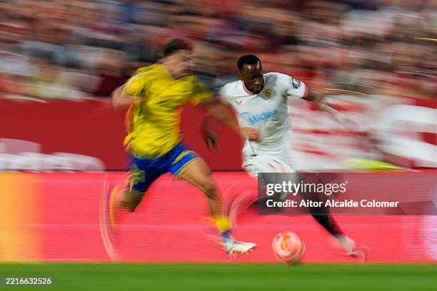 Dodi Lukebakio of Sevilla CF run with the ball during the LaLiga match between Sevilla FC and UD Las Palmas at Estadio Ramon Sanchez Pizjuan on May...
