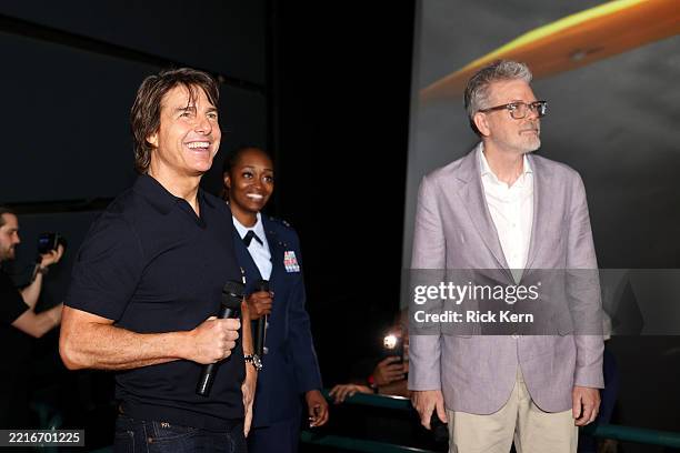 Tom Cruise, a guest and Christopher McQuarrie attend the “Mission: Impossible – The Final Reckoning” Texas PA Tour at AMC Rivercenter 11 on May 22 in...
