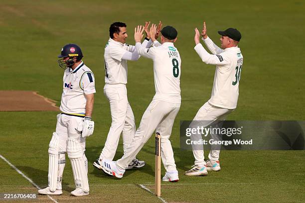 Mohammad Abbas of Nottinghamshire celebrates with teammates after taking the wicket of Adam Lyth of Yorkshire during the Rothesay County Championship...