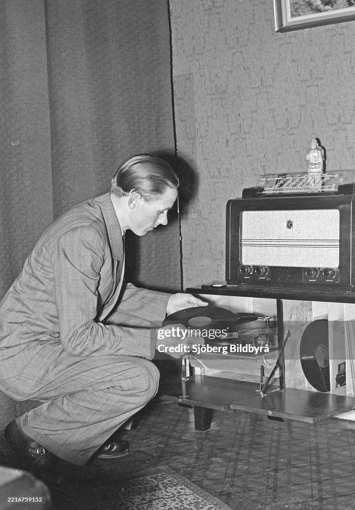 In the 1940s. World champion runner Gunder Hägg, 1918-2004, from Sweden pictured in his home while lis...