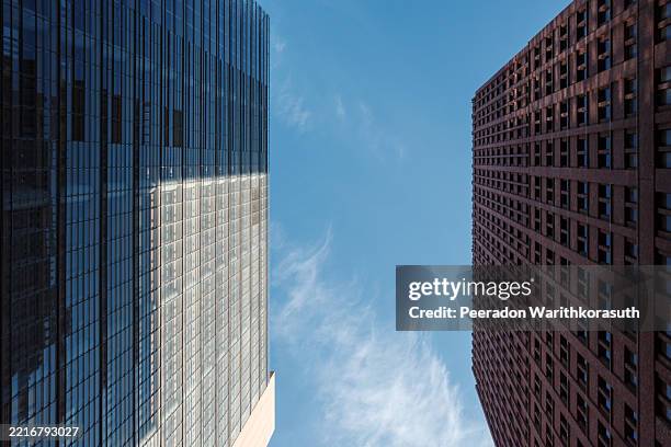 sky view between modern towers - height difference stock pictures, royalty-free photos & images