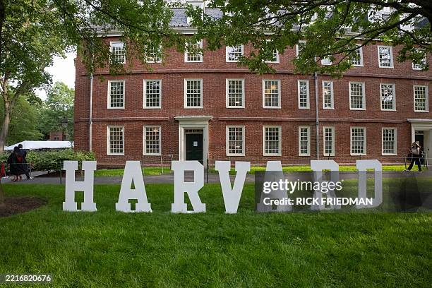 Harvard sign is seen at the Harvard University campus in Boston, Massachusetts, on May 27, 2025. Harvard students protested Tuesday after the US...