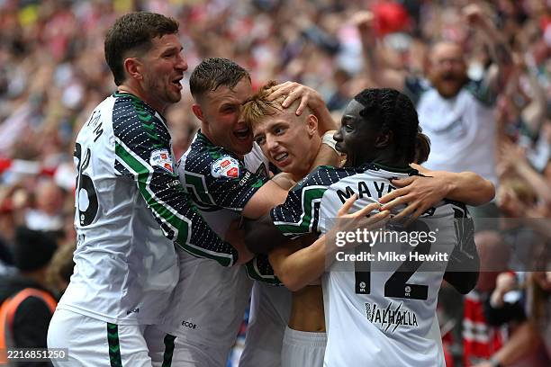 Tom Watson of Sunderland celebrates scoring his team's second goal with teammates during the Sky Bet Championship Play-Off Final match between...