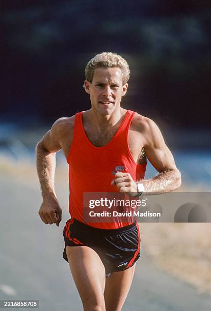 Mark Risson Mark Sisson trains on a path near Crystal Springs Reservoir in San ...