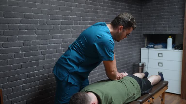 https://media.gettyimages.com/id/2216860391/video/chiropractor-using-controlled-pressure-to-perform-lower-back-adjustment-on-patient.jpg?b=1&s=640x640&k=20&c=DFLPL_eYStyLjNIUO43OnzCcnNGn7wKTdZWjbTWjYQI=