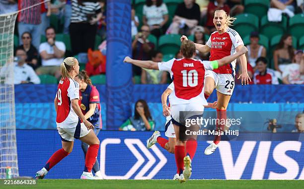 Stina Blackstenius of Arsenal celebrates scoring her team's first goal with teammates during the UEFA Women's Champions League final match between...