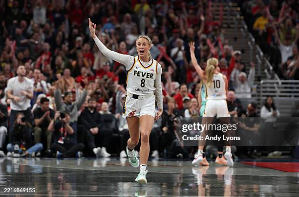 Sophie Cunningham of the Indiana Fever celebrates after making a three point shot against the New York Liberty at Gainbridge Fieldhouse on May 24,...