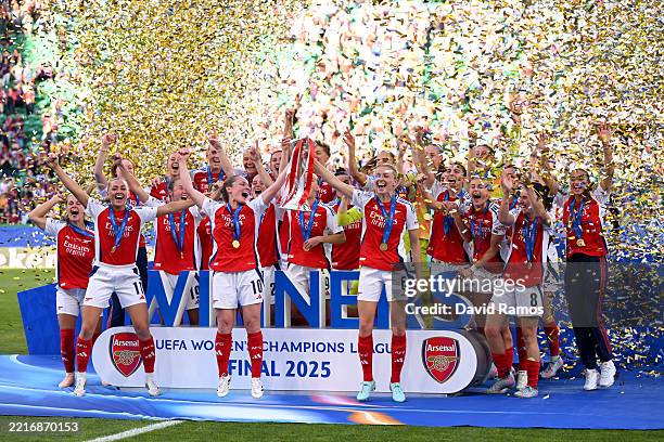 Kim Little and Leah Williamson of Arsenal lifts the UEFA Women's Champions League trophy after their team's victory in the UEFA Women's Champions...