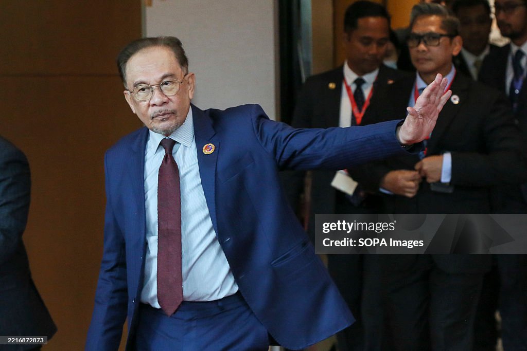 Anwar Ibrahim the Prime Minister of Malaysia seen waves to...