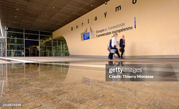People walk out of the Berlaymont, the EU Commission headquarter on May 28, 2025 in Brussels, Belgium.