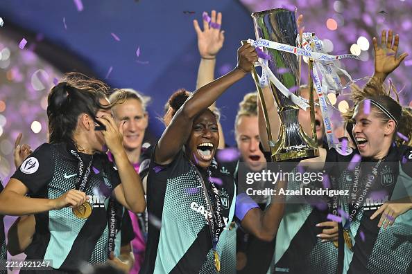 Mandy Freeman Mandy Freeman of NJ/NY Gotham FC lifts the trophy with teammates ...