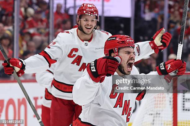 Logan Stankoven of the Carolina Hurricanes celebrates after scoring a goal against the Florida Panthers during the second period in Game Three of the...