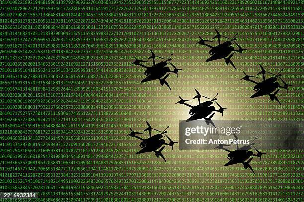 swarm kamikaze drones at digital code background - combat command and control system stock pictures, royalty-free photos & images