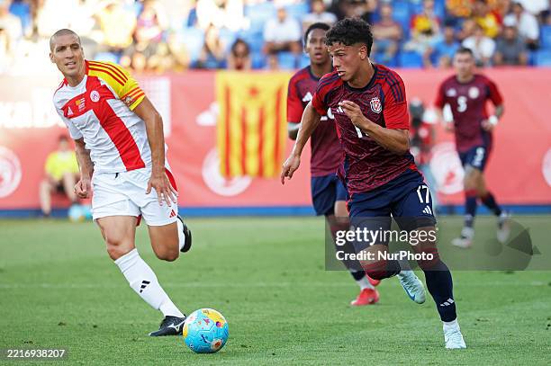Warren Madrigal and Oriol Romeu play during the friendly match between Catalonia and Costa Rica at the Johan Cruyff Stadium in Barcelona, Spain, on...