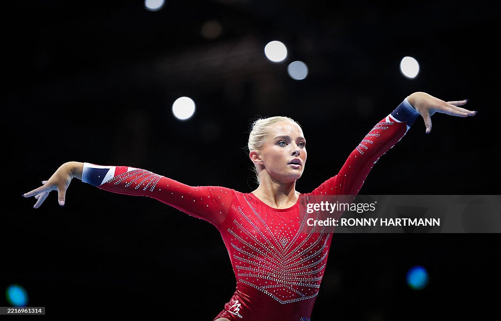 Ruby Evens Britain's Ruby Evans performs on the floor exercise during the mixed ...