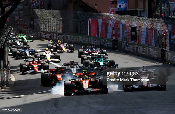 Lando Norris of Great Britain driving the McLaren MCL39 Mercedes leads Charles Leclerc of Monaco driving the Scuderia Ferrari SF-25 Oscar Piastri of...