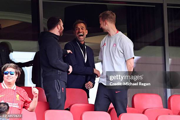 Former Liverpool Manager and current Head of Global Soccer for Red Bull GmbH Juergen Klopp reacts as he speaks with guests in an executive box prior...