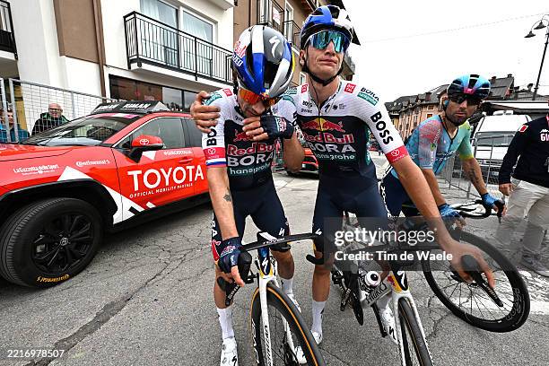 Primoz Roglic of Slovenia and Giulio Pellizzari of Italy and Team Red Bull - BORA - hansgrohe react after the 108th Giro d'Italia 2025, Stage 15 a...