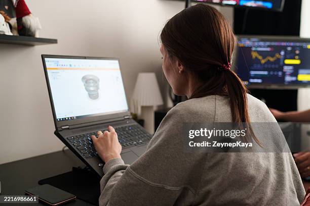 woman creating 3d model on computer for home 3d printing project - prototype stock pictures, royalty-free photos & images