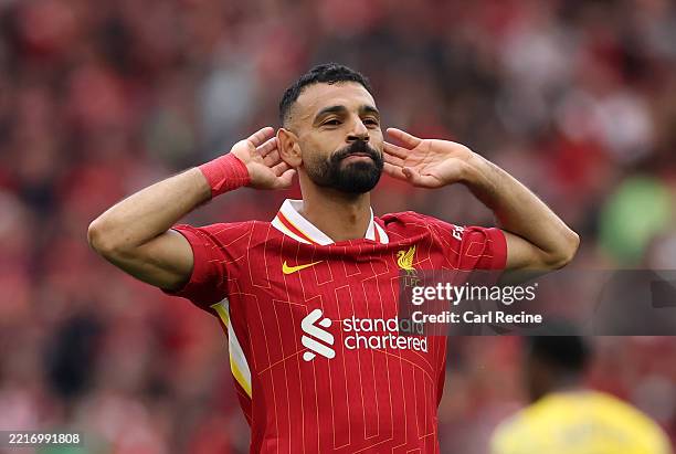 Mohamed Salah of Liverpool celebrates scoring his team's first goal during the Premier League match between Liverpool FC and Crystal Palace FC at...