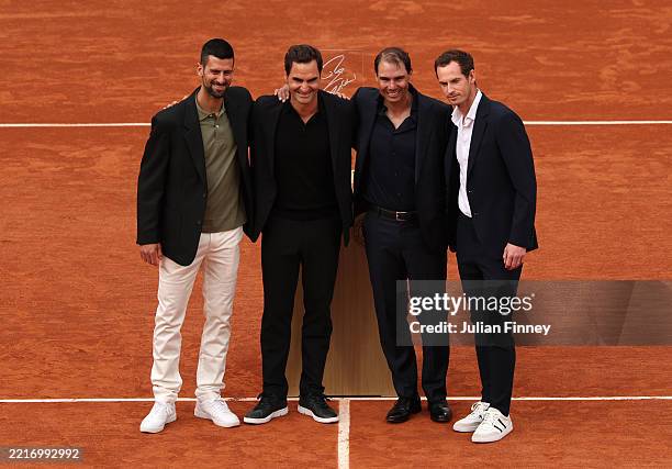 Rafael Nadal poses for a photo with Roger Federer, Novak Djokovic and Andy Murray on Court Philippe-Chatrier during a ceremony held in his honour on...