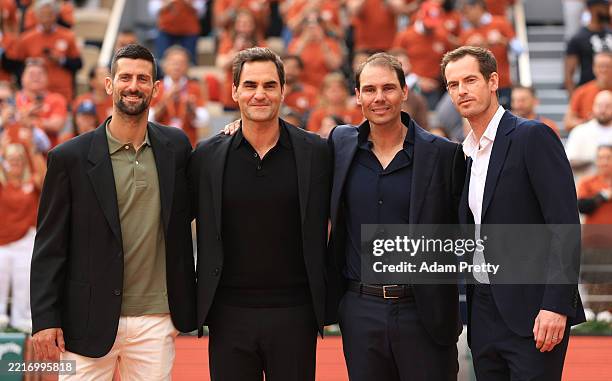 Rafael Nadal poses for a photo with Roger Federer, Novak Djokovic and Andy Murray on Court Philippe-Chatrier during a ceremony held in his honour on...