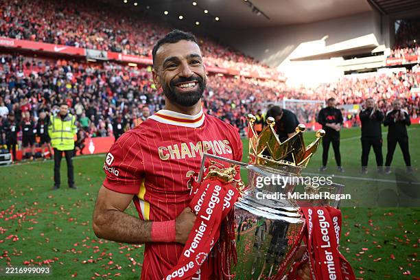 Mohamed Salah of Liverpool celebrates with the Premier League trophy trophy, as Liverpool are crowned the Champions of the Premier League for the...