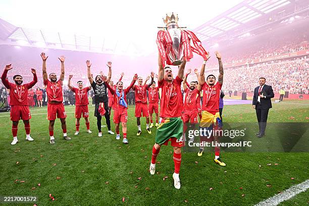 Diogo Jota of Liverpool celebrates with the Premier League trophy, as Liverpool are crowned the Champions of the Premier League for the 2024/25...