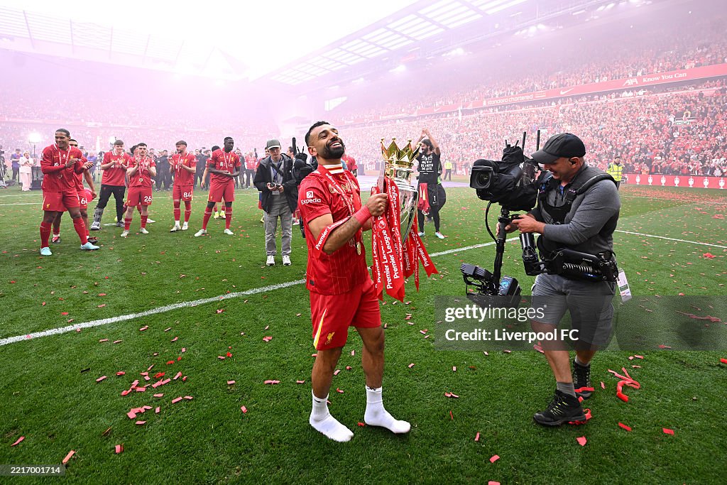Liverpool Rm Mohamed Salah of Liverpool celebrates with the Premier League trophy ...