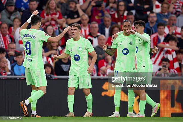 Robert Lewandowski of FC Barcelona celebrates with his teammates after scoring his team's second goal during the LaLiga EA Sports match between...