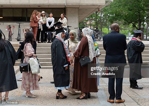 Mit Graduation Suits MIT students wait in line to take pictures in front of a sign on MIT ...