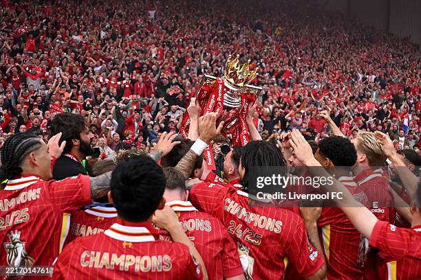 Andrew Robertson of Liverpool and his teammates celebrate with Premier League trophy, as Liverpool are crowned the Champions of the Premier League...