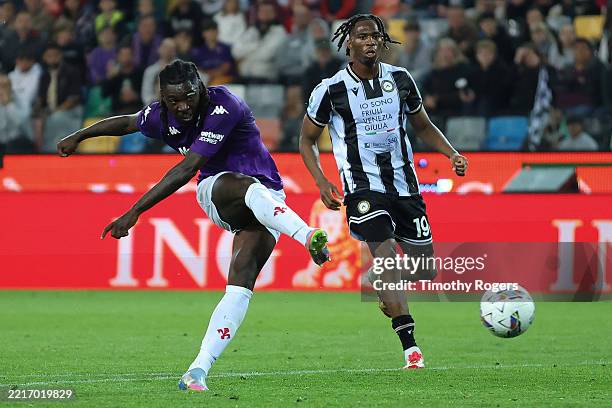 Moise Kean of Fiorentina scores his team's third goal during the Serie A match between Udinese and Fiorentina at Stadio Friuli on May 25, 2025 in...