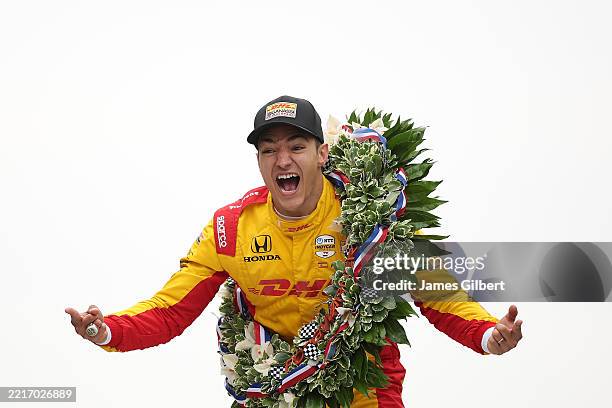 Alex Palou, driver of the DHL Chip Ganassi Racing Honda, celebrates after winning the NTT IndyCar Series109th Running Of The Indianapolis 500 at...