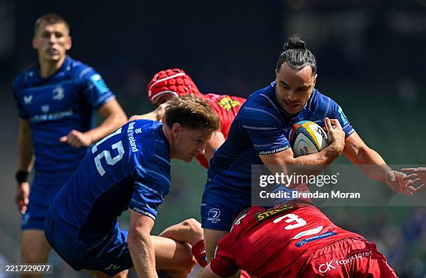 Dublin , Ireland - 31 May 2025; James Lowe of Leinster is tackled by Henry Thomas of Scarlets during the United Rugby Championship quarter-final...