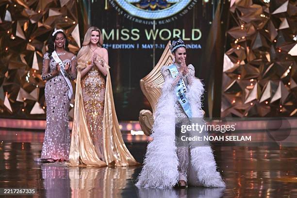 Thailand's Opal Suchata Chuangsri celebrates after winning the 72th Miss World 2025 pageant at the HITEX Exhibition Centre in Hyderabad on May 31,...